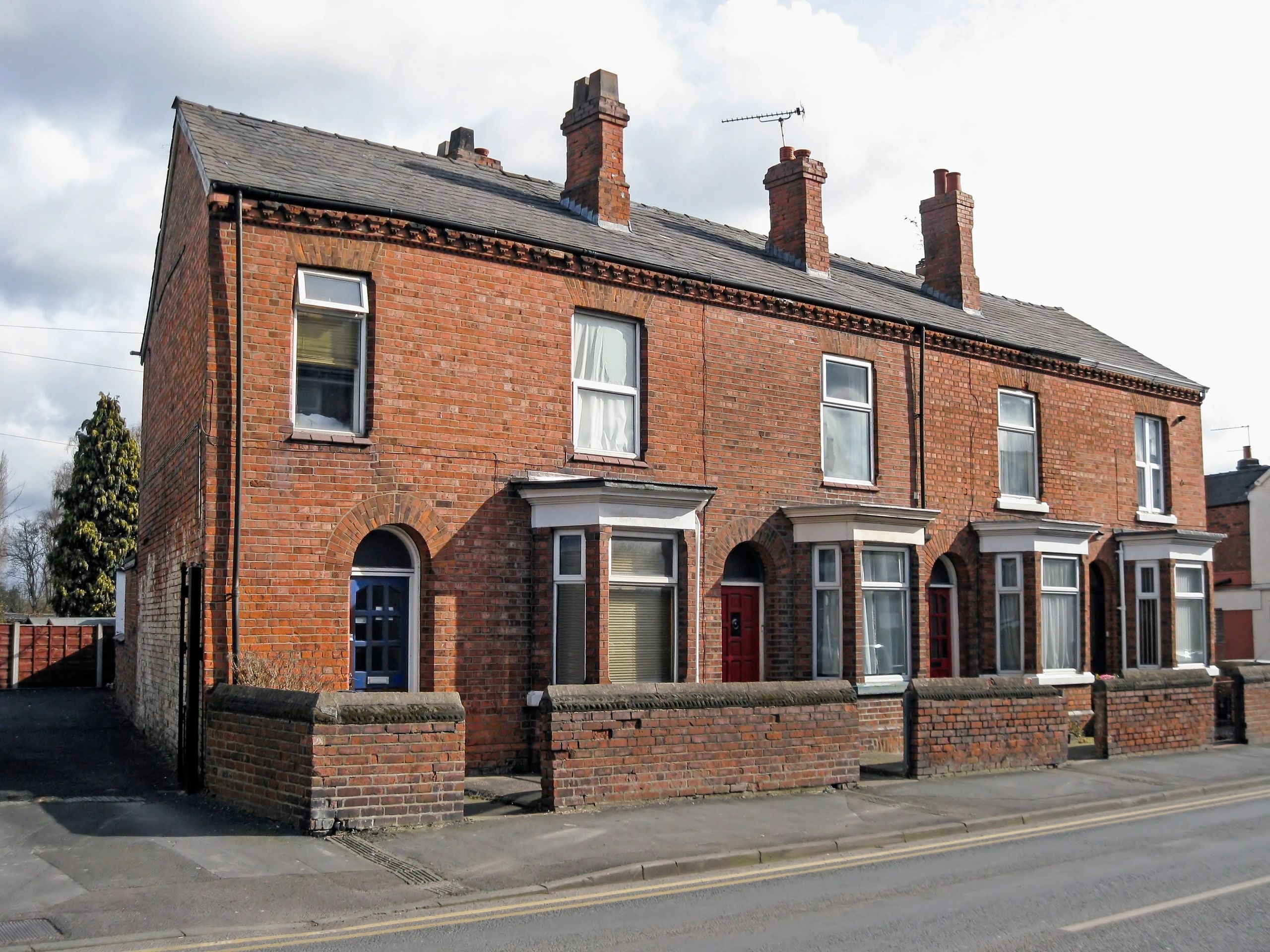 Professional surveyor inspecting property